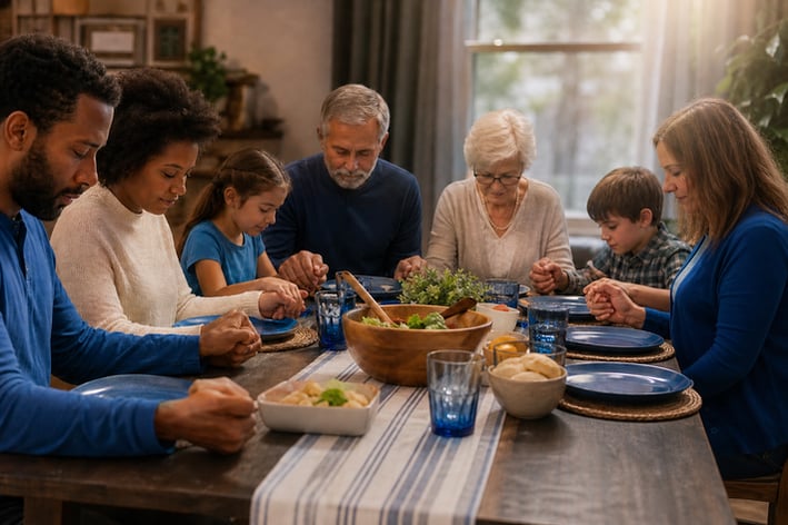 Saying grace before dinner with friends