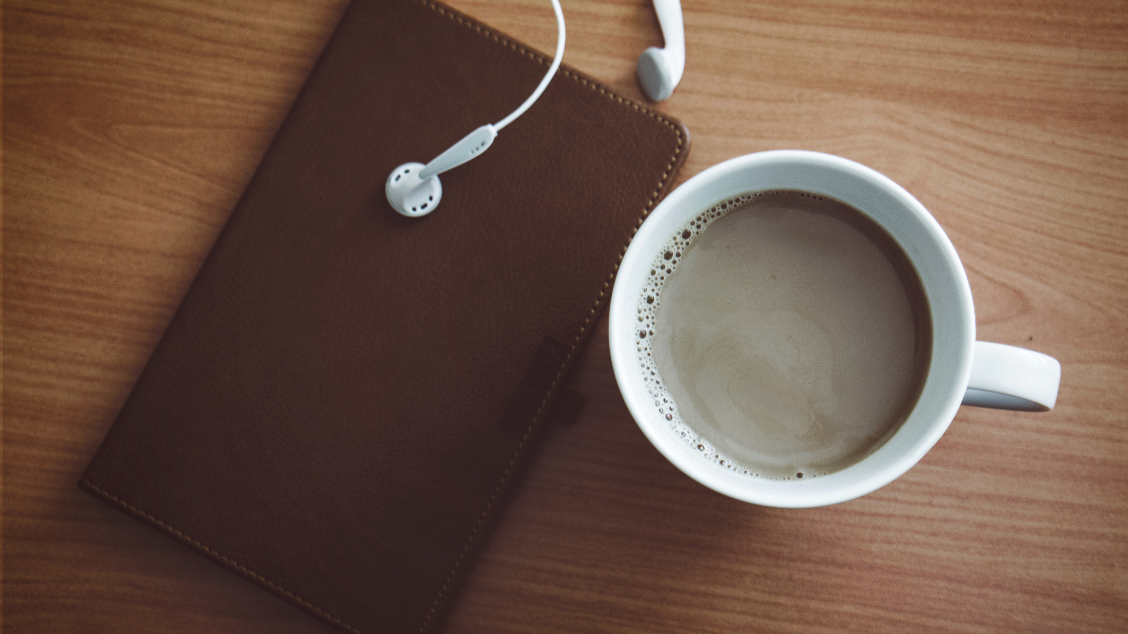 Engaging scripture - coffee and earbuds