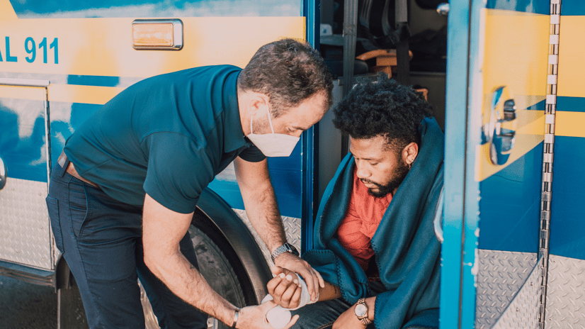 medic helping patient