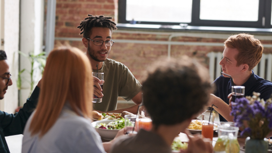 people eating around a table-1