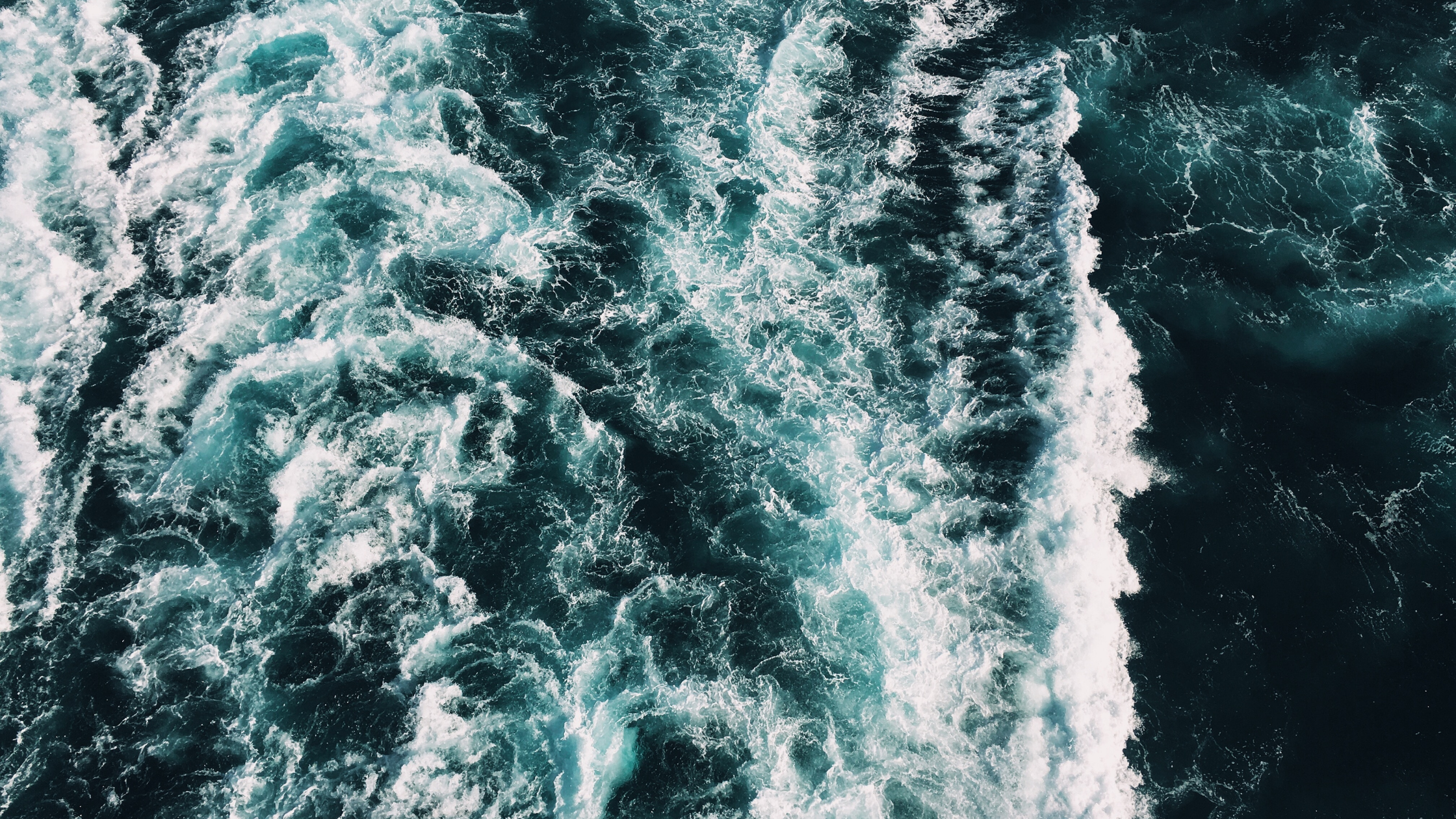 waves dashing against rocks